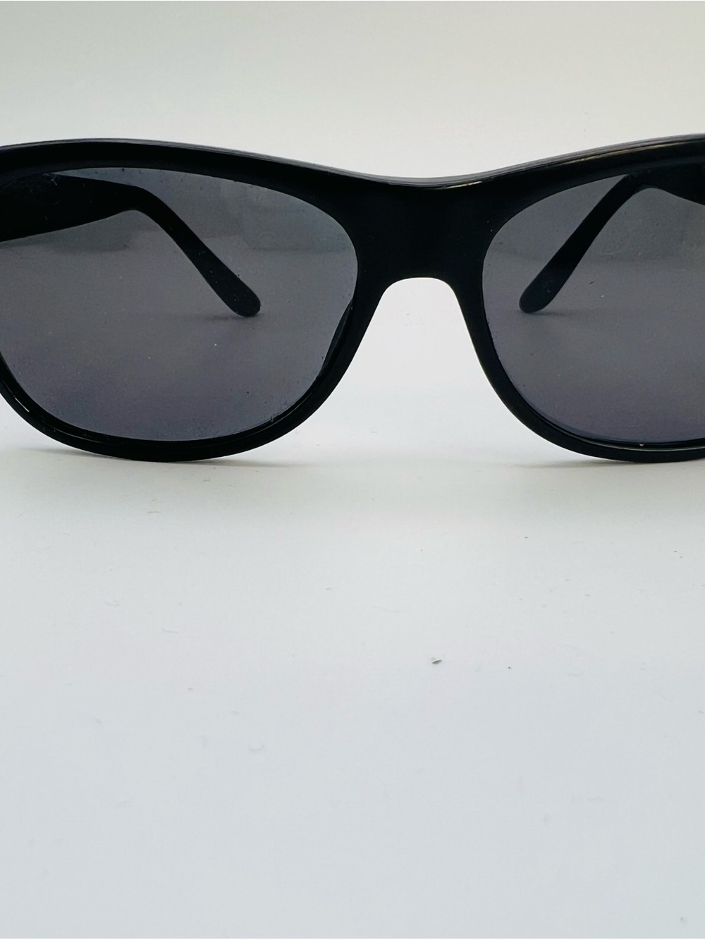Gucci Black Frame Sunglasses with Dark Gray Lenses